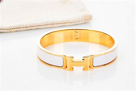 hermes gold and white enamel bracelet